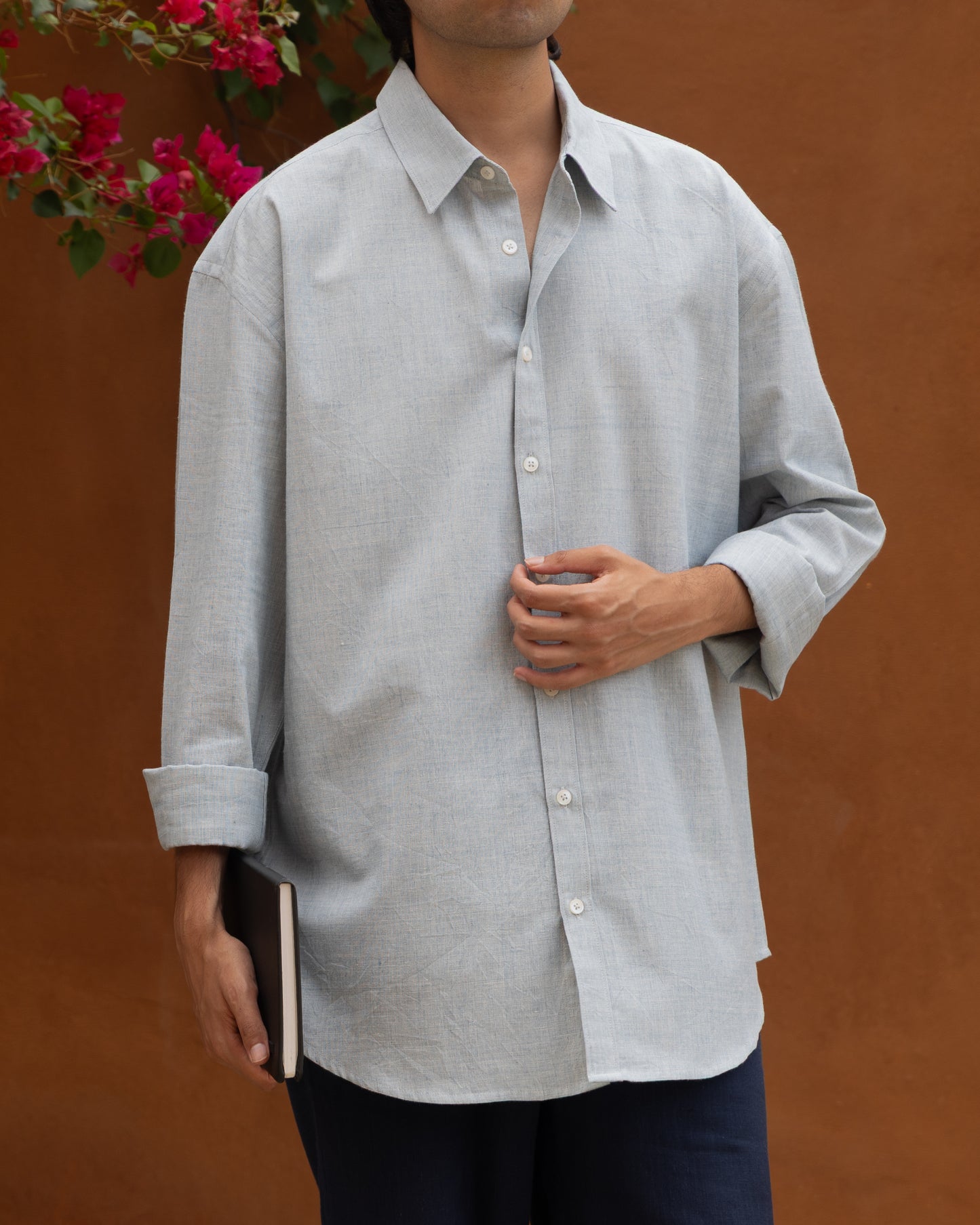 Baby blue relaxed fit Khadi cotton shirt for men, handcrafted with organic handloom fabric, featuring a soft pastel and earthy tone, eco-friendly and breathable, perfect light color shirt for sustainable fashion enthusiasts.