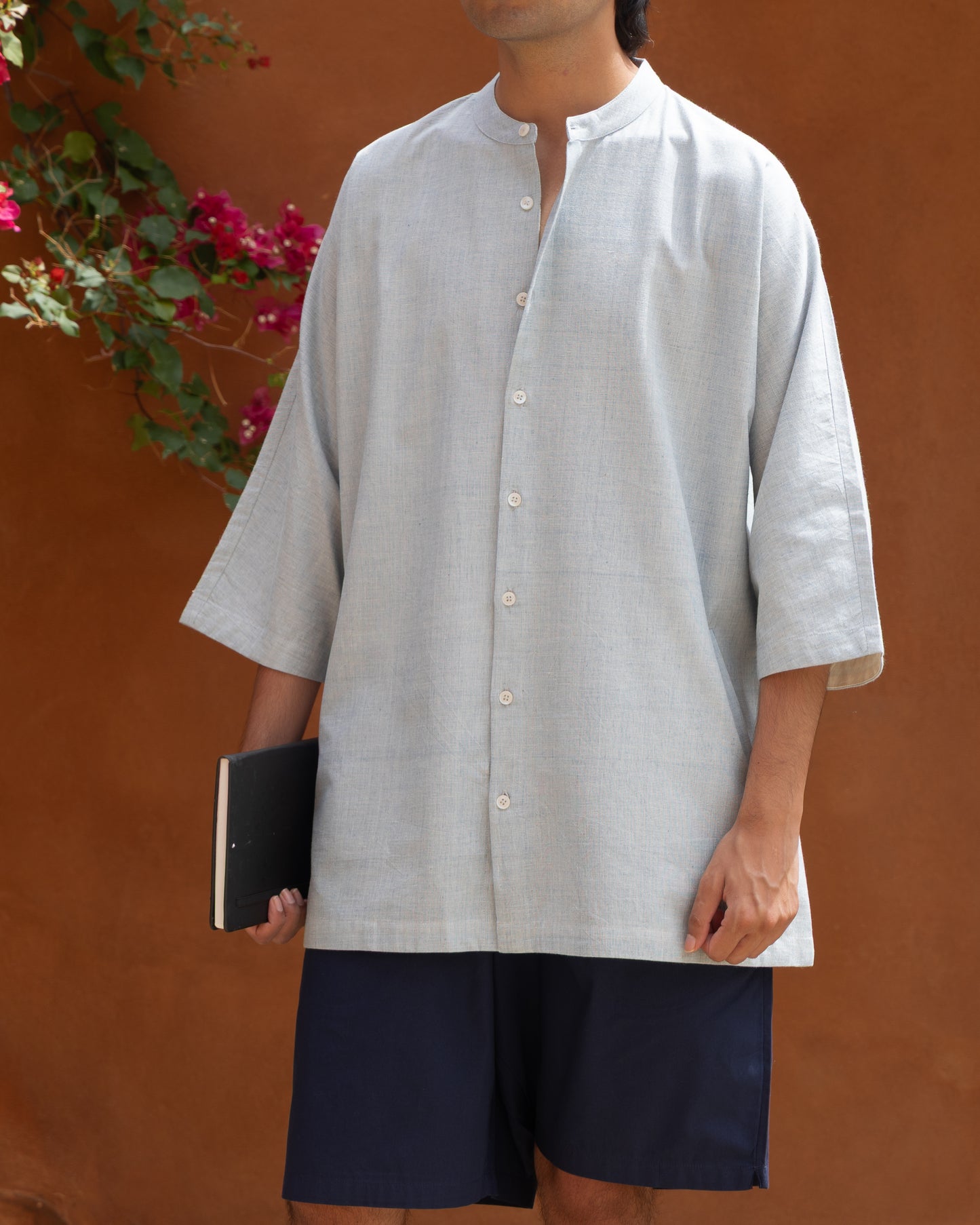 Soft blue handwoven Khadi shirt for men with kimono sleeves, combining Japanese aesthetics with sustainable fashion.