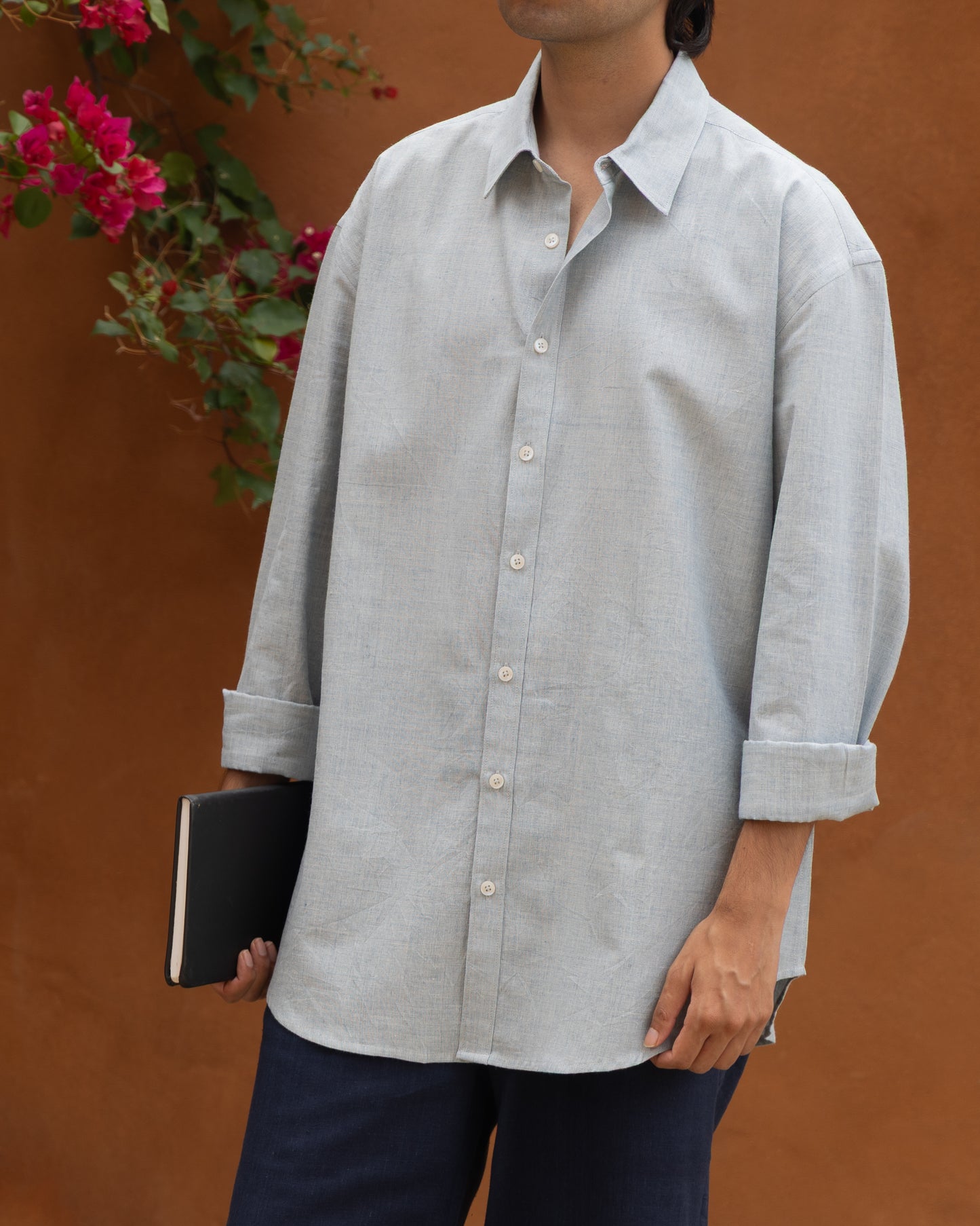 Soft baby blue Khadi shirt for men, relaxed fit with breathable organic cotton, handwoven handloom fabric, eco-friendly and limited edition, perfect light color shirt for men who love sustainable and earthy fashion.