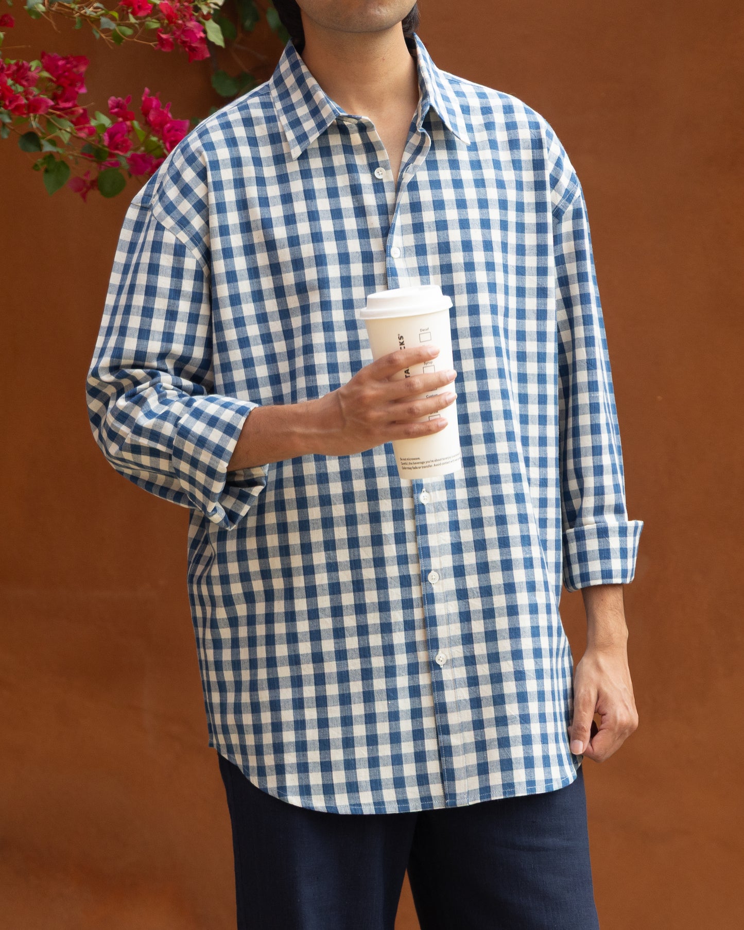 Handwoven Khadi cotton shirt for men with blue box design, lightweight and eco-friendly. Limited edition handloom shirt with earthy tones, ideal for men’s light color shirts collection.