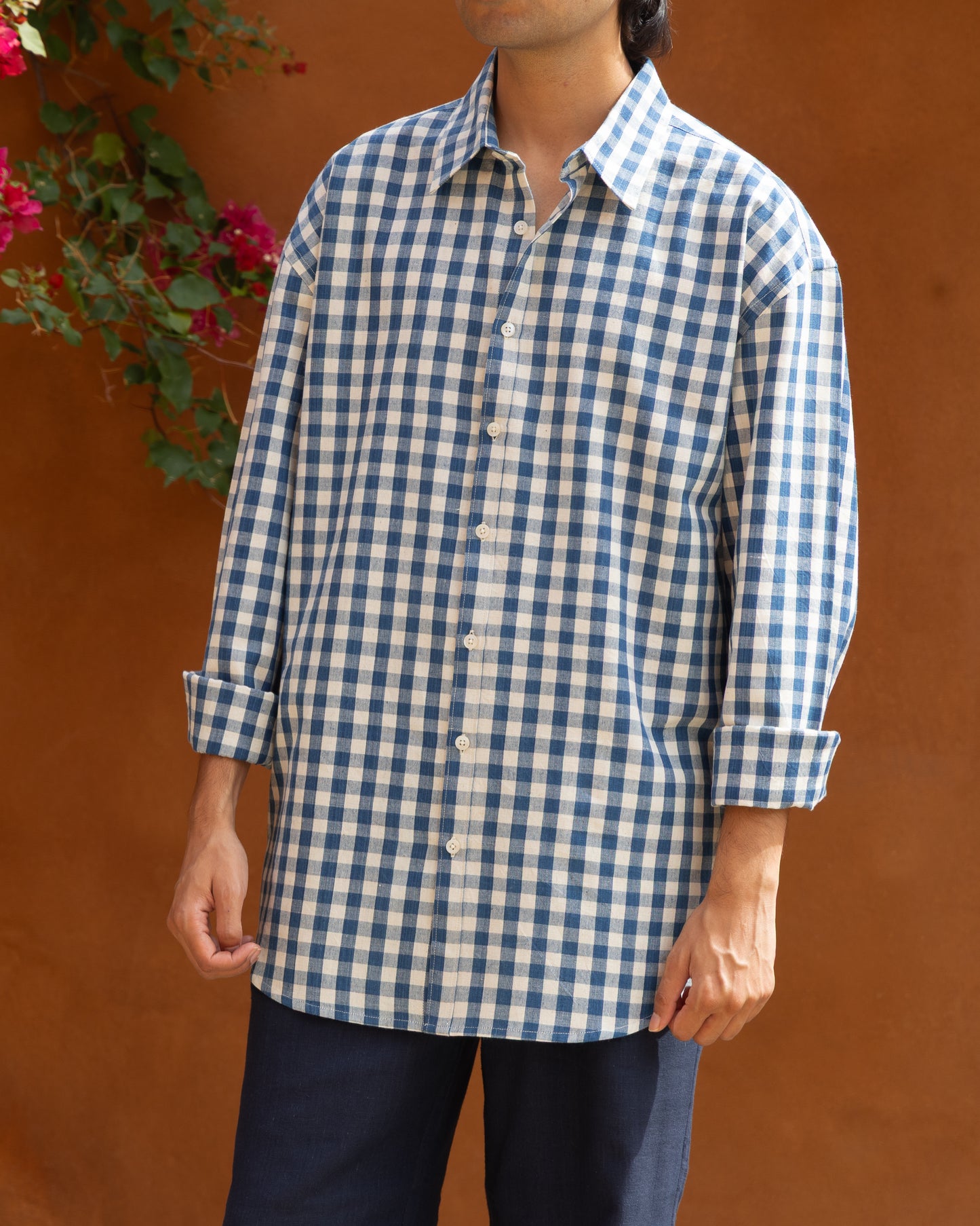 Khadi shirt for men featuring blue box pattern, made from handwoven organic cotton. Light color, earthy tone, and eco-friendly handloom shirt for men.