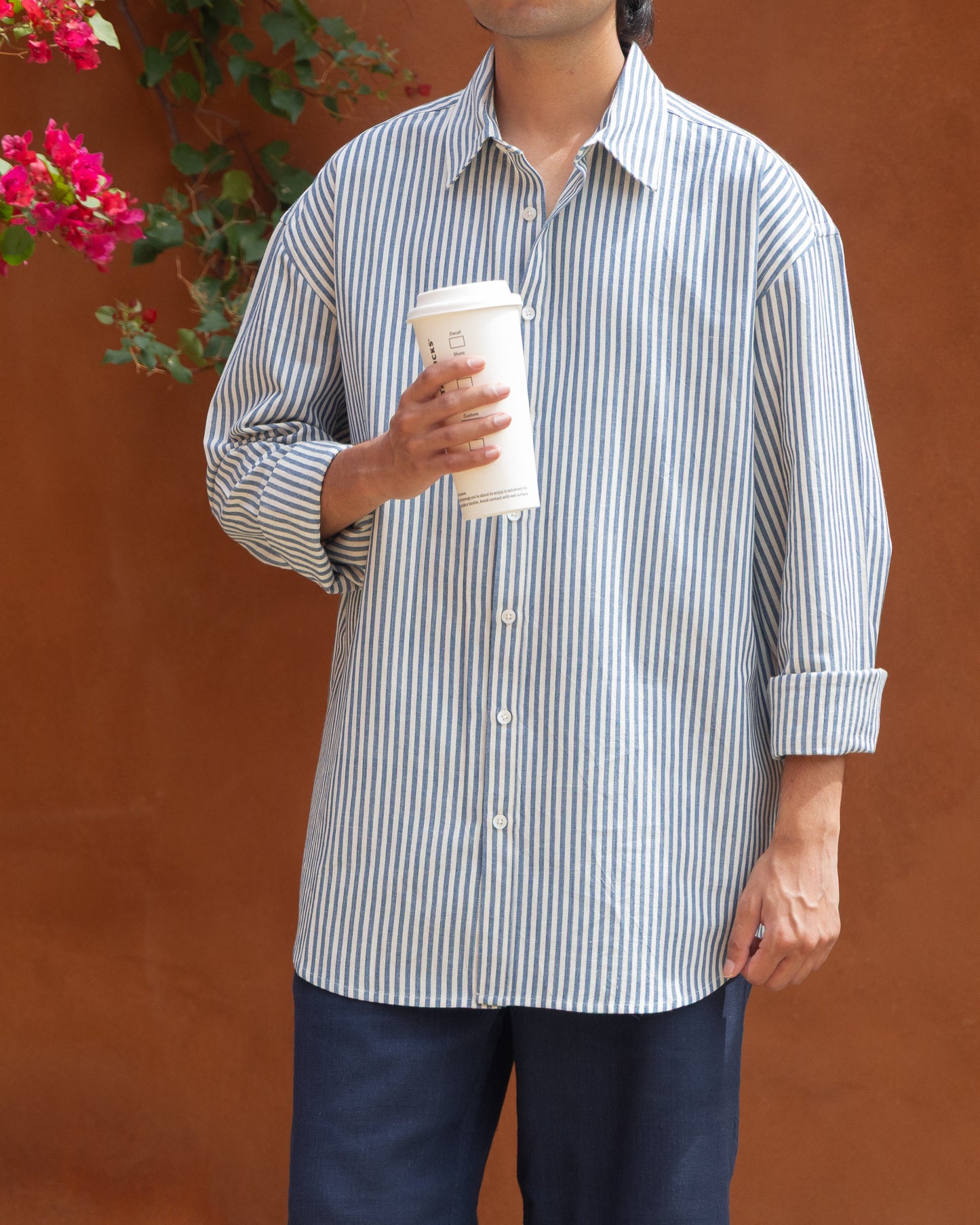 Men's handwoven Khadi shirt with blue stripes in a comfortable relaxed fit, perfect for light color and earthy tone shirt lovers.