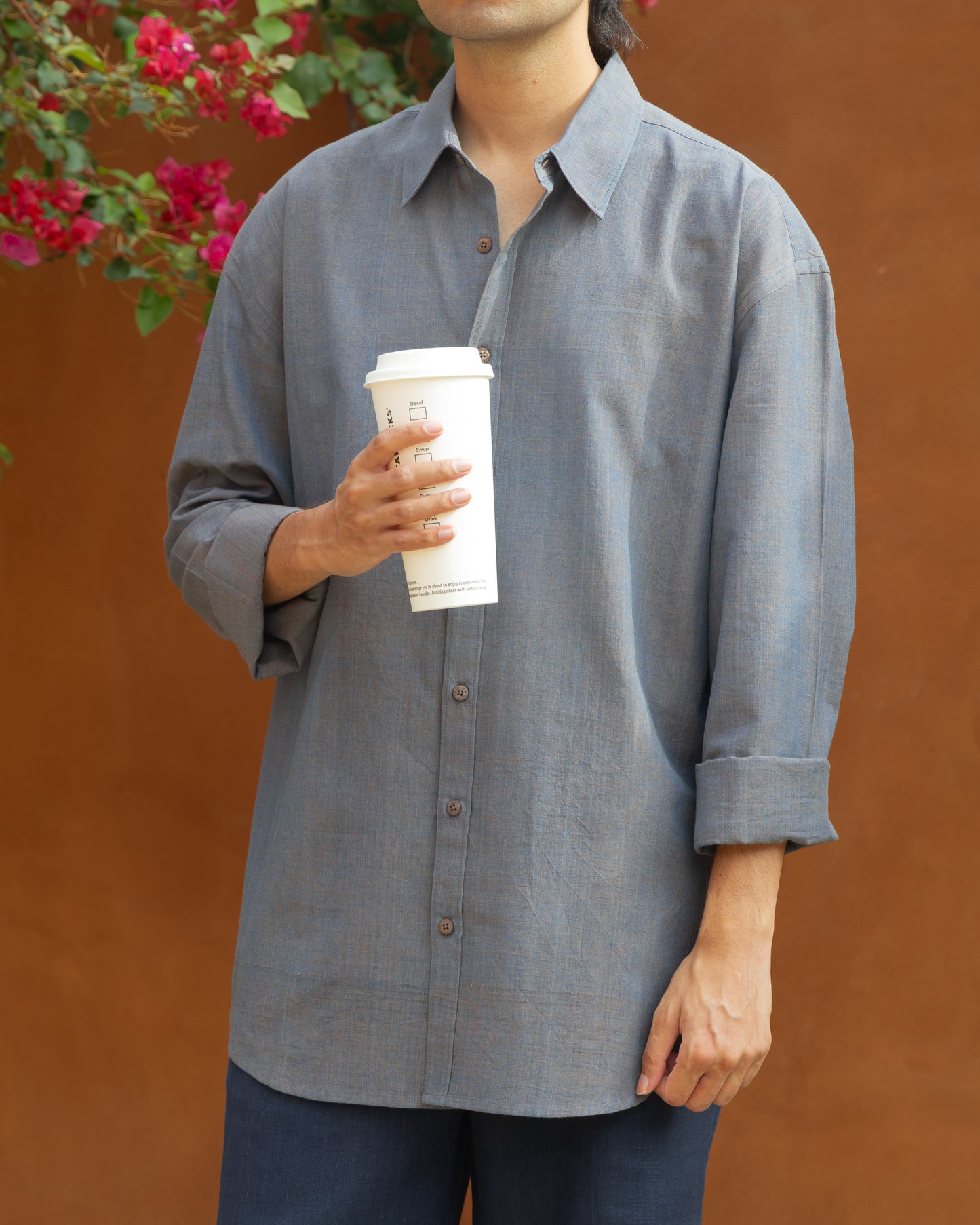 Charcoal grey relaxed fit Khadi cotton shirt for men, handcrafted from organic cotton handloom fabric. Eco-friendly, handwoven luxury shirt in earthy tone, perfect light color shirt for men seeking sustainable Khadi clothes.