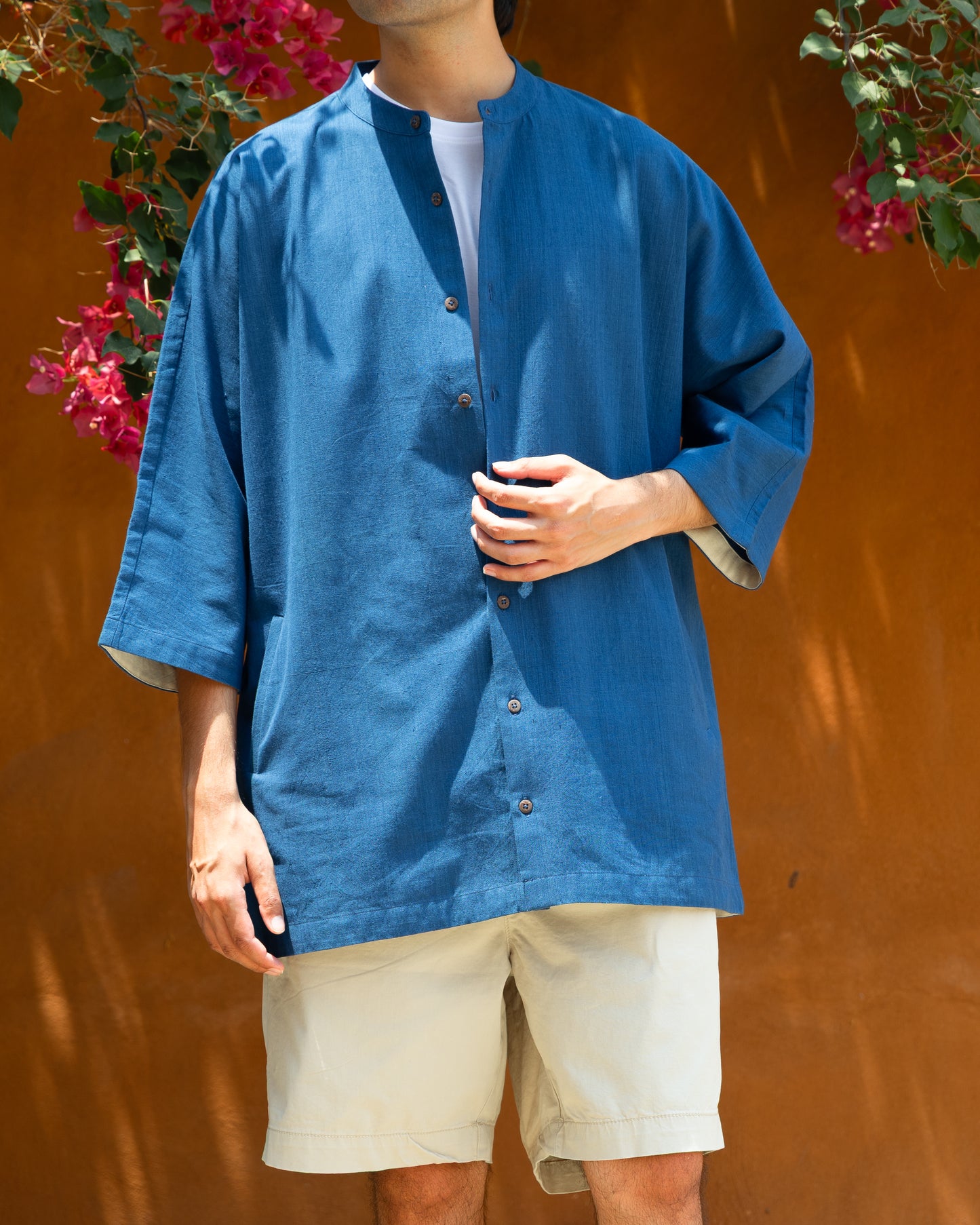 Handloom deep blue kimono sleeve shirt made from Khadi cotton, perfect luxury organic cotton shirt for men in earthy tones.