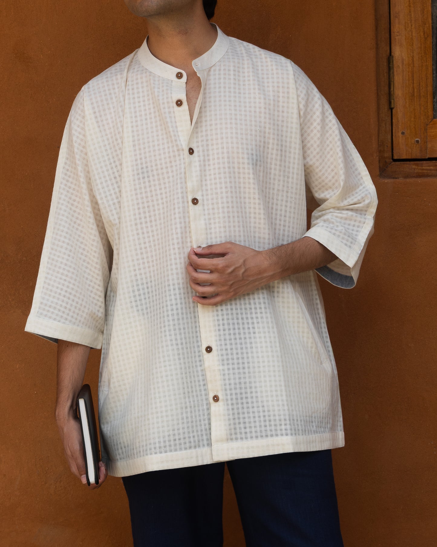 Light pastel ecru handloom shirt for men featuring a Japanese kimono-style cut, quarter-length sleeves, and breathable khadi cotton.