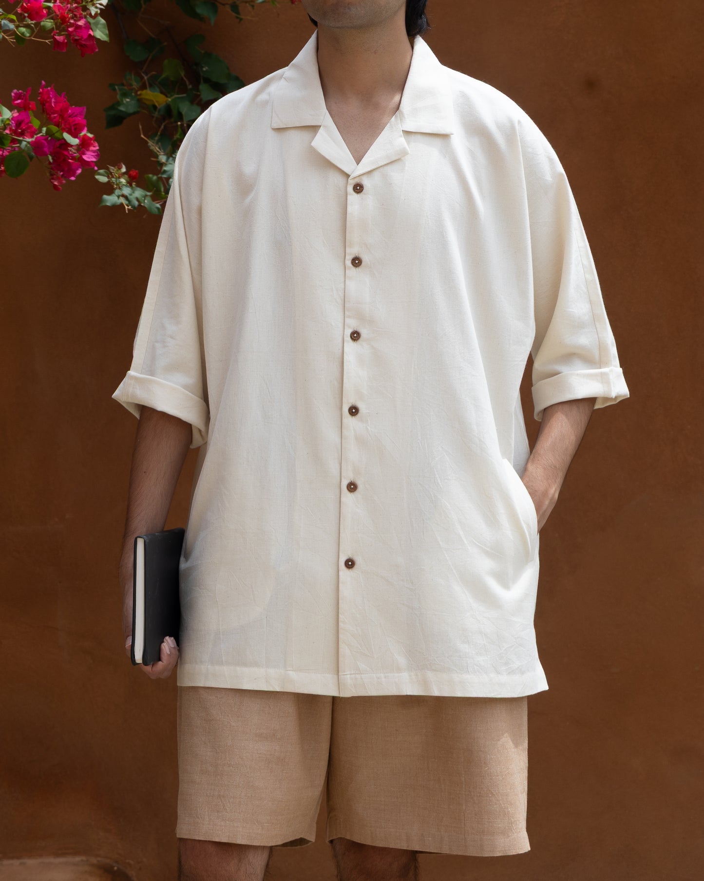 Limited edition earthy tone Khadi shirt for men, soft undyed cotton with relaxed fit and quarter-length kimono sleeves, perfect eco-friendly handloom wear.
