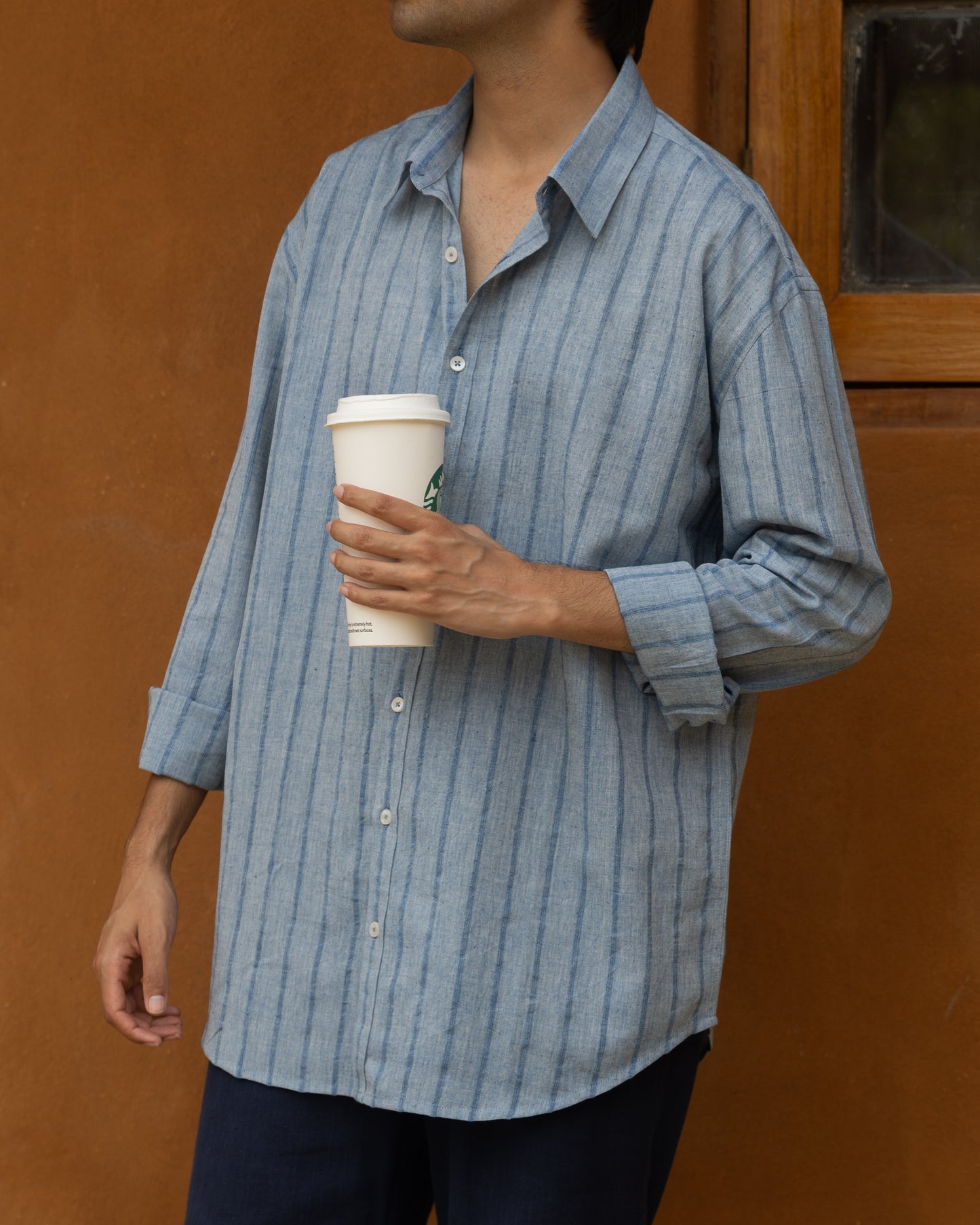 Eco-friendly relaxed fit shirt in rich indigo tone, crafted from handloom khadi cotton for a sustainable and stylish everyday option.