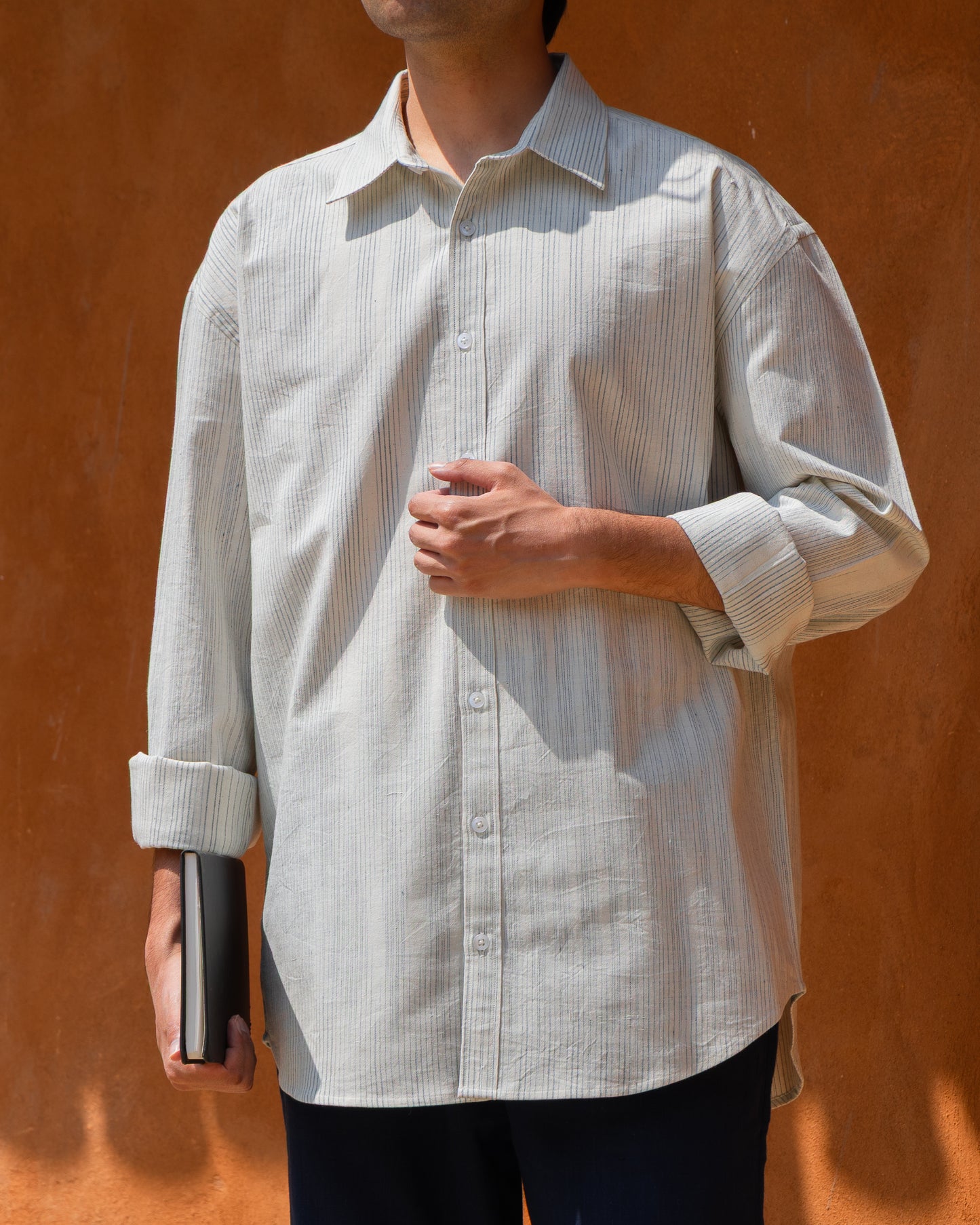 Khadi cotton shirt for men in Kora indigo faded stripes – relaxed fit, handwoven and organic, light color eco-friendly handloom shirt.