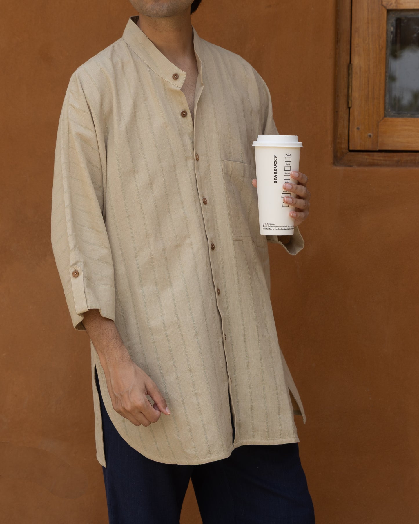 Basil green khadi cotton kimono shirt for men with 3/4 sleeves, handwoven from organic fabric in a relaxed Japanese-style silhouette.