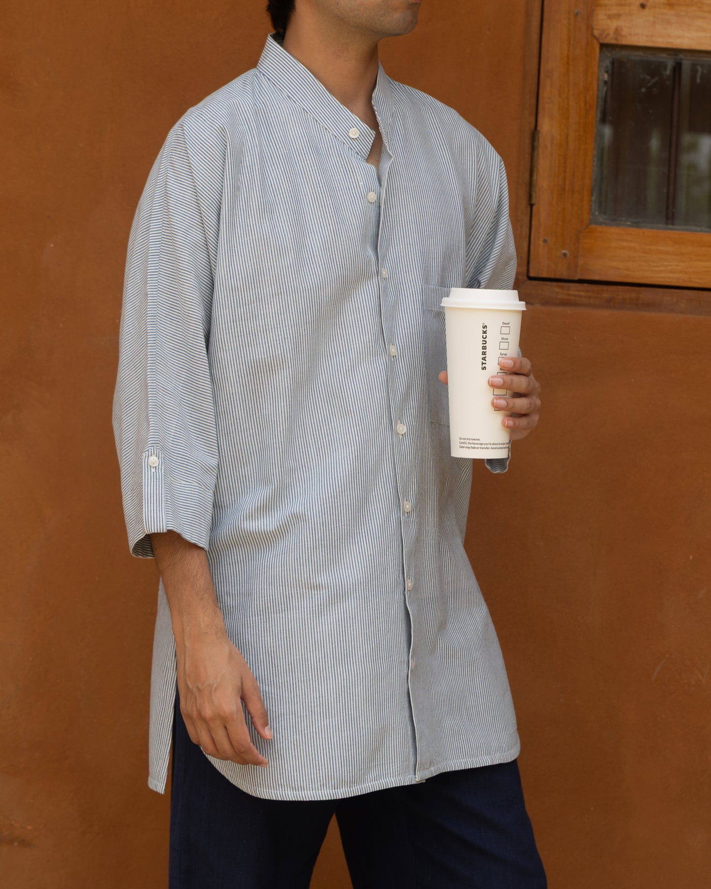 Capri blue striped khadi cotton kimono shirt for men with 3/4 sleeves, handwoven from organic fabric in a relaxed, airy silhouette.