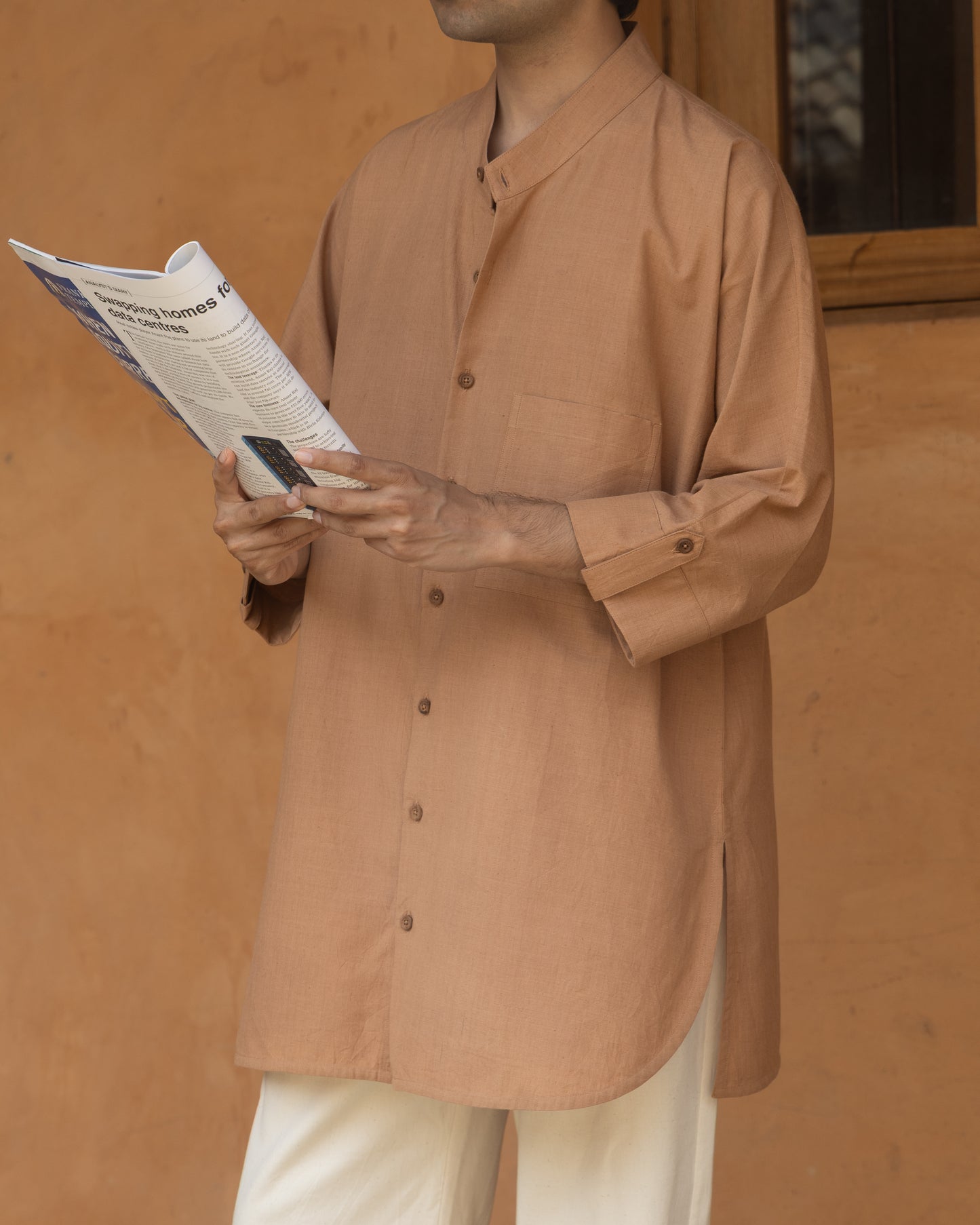 Earthy brown Japanese-style kimono shirt for men made from handwoven organic cotton with a relaxed fit and quarter-length sleeves.