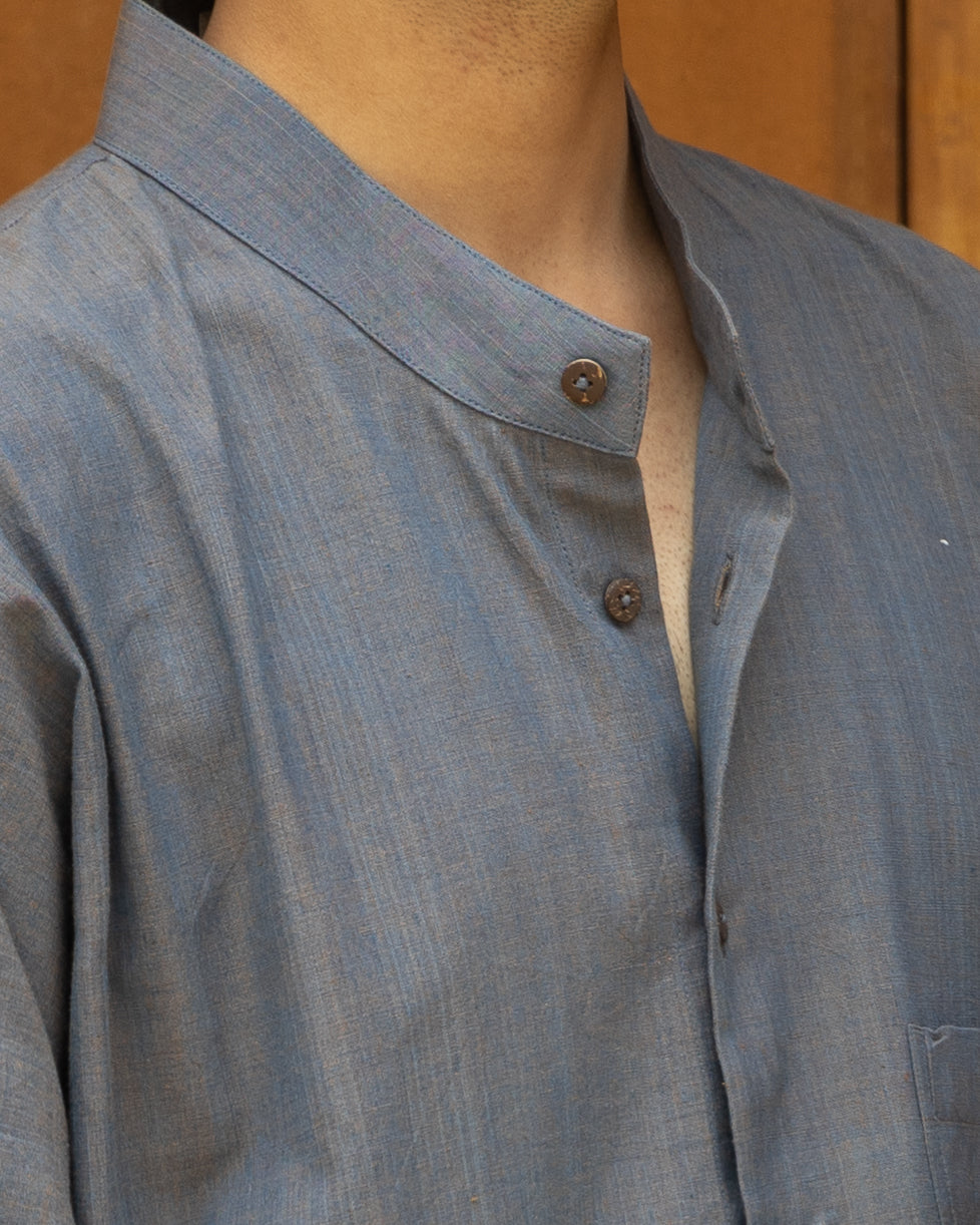 Limited edition Khadi cotton shirt with curved hem and quarter sleeves in a modern charcoal grey palette.