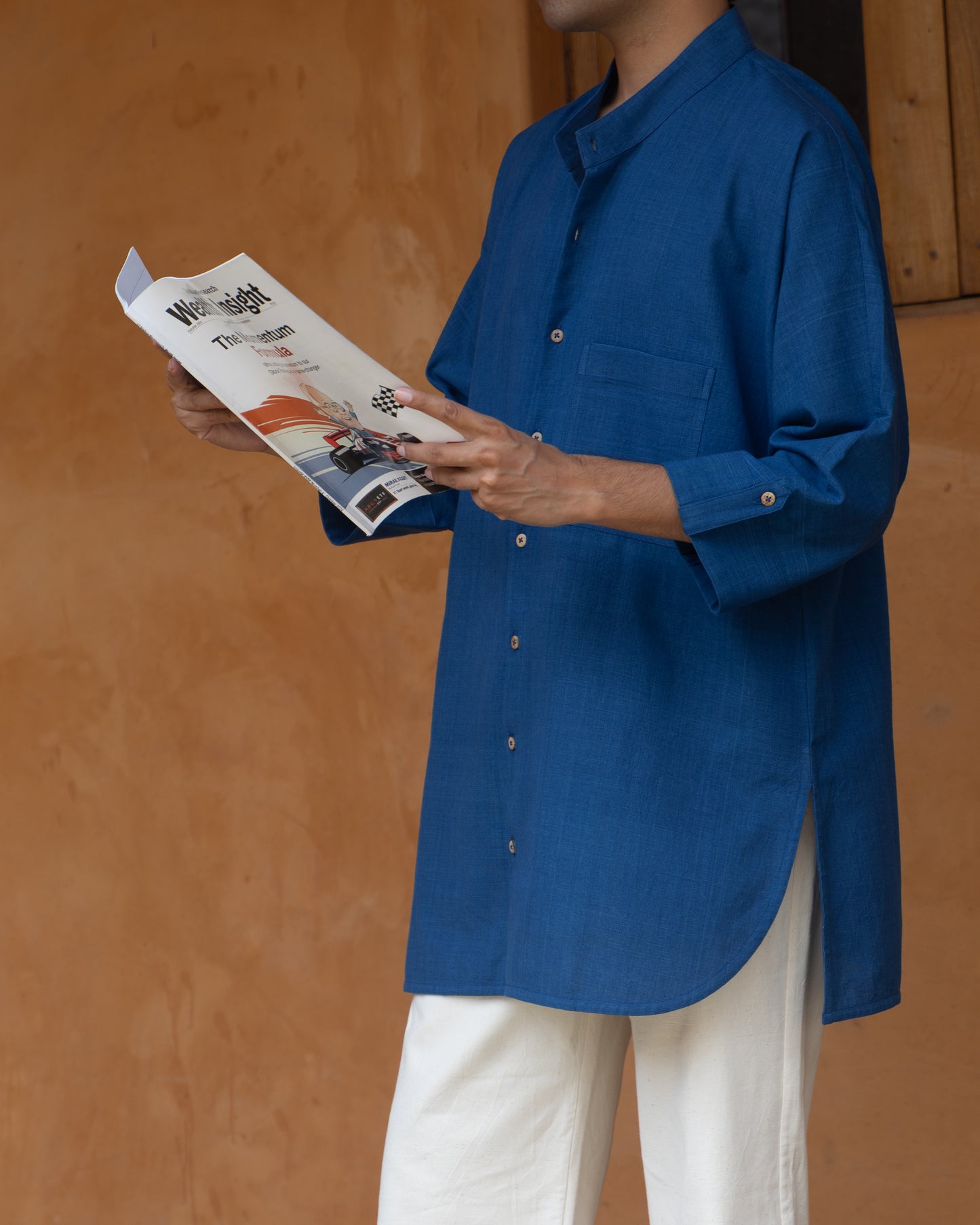 Handwoven deep blue kimono shirt for men with 3/4 sleeves, made from eco-friendly organic cotton in a traditional Japanese-inspired design.