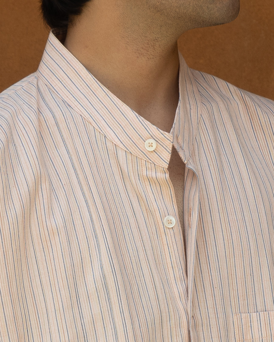 Pastel pink handloom shirt for men with kimono sleeves and multicolor stripes, made from breathable and eco-friendly khadi cotton.