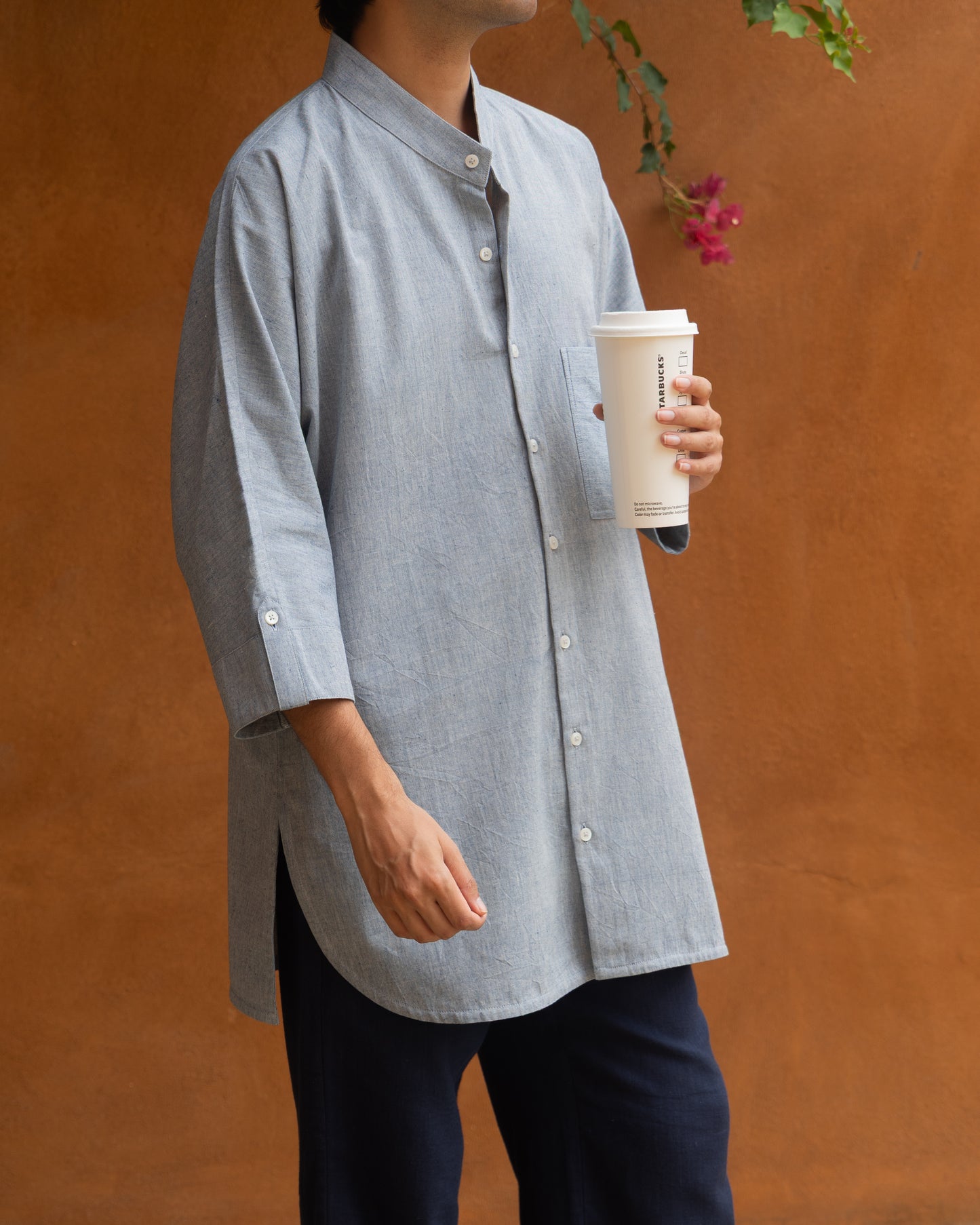 Soft indigo mélange khadi cotton kimono shirt for men with 3/4 sleeves, handwoven from organic fabric in a relaxed Japanese-style cut.