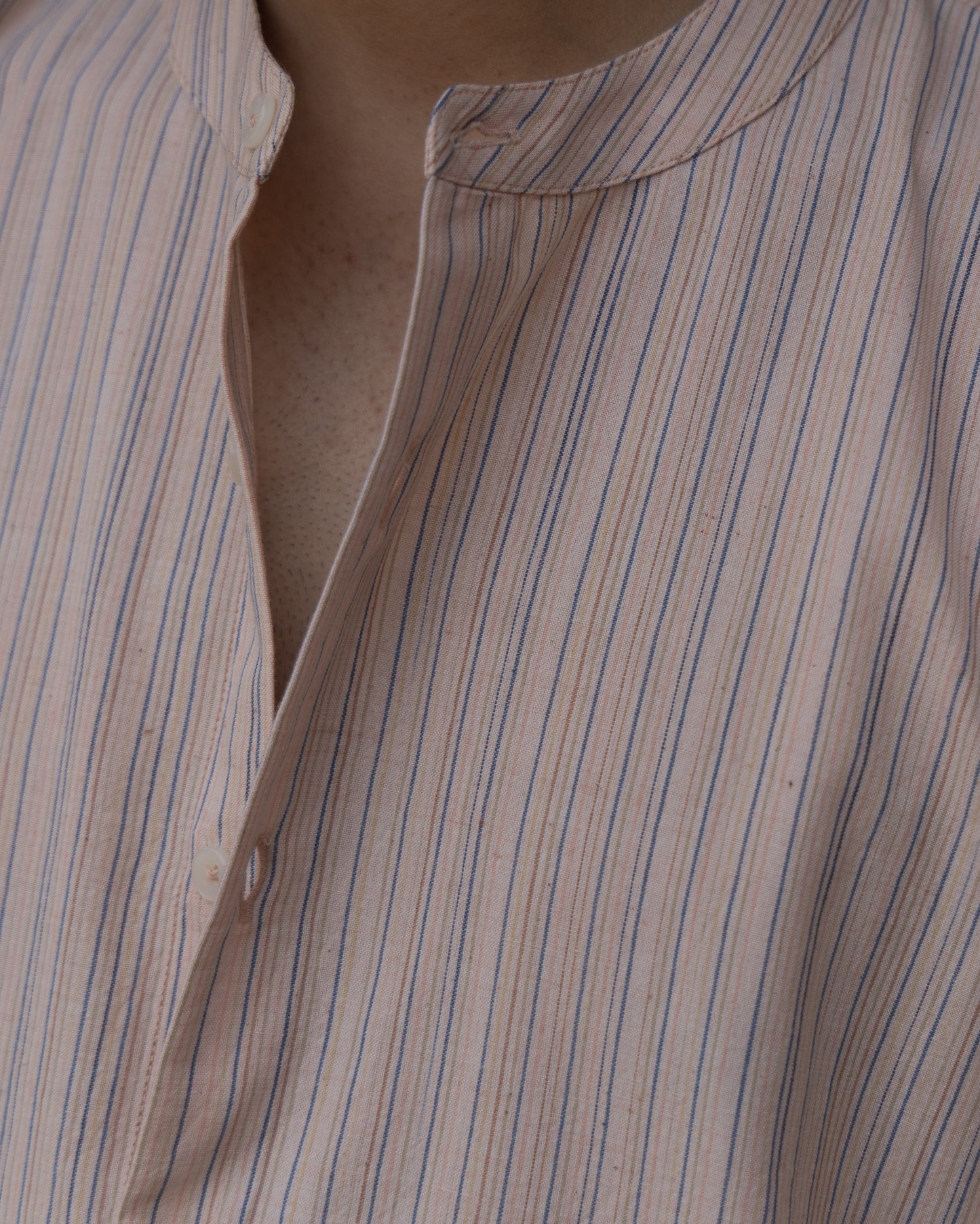 Handloom striped khadi shirt for men with kimono sleeves and soft earthy colors, ideal for summer wear and sustainable fashion lovers.
