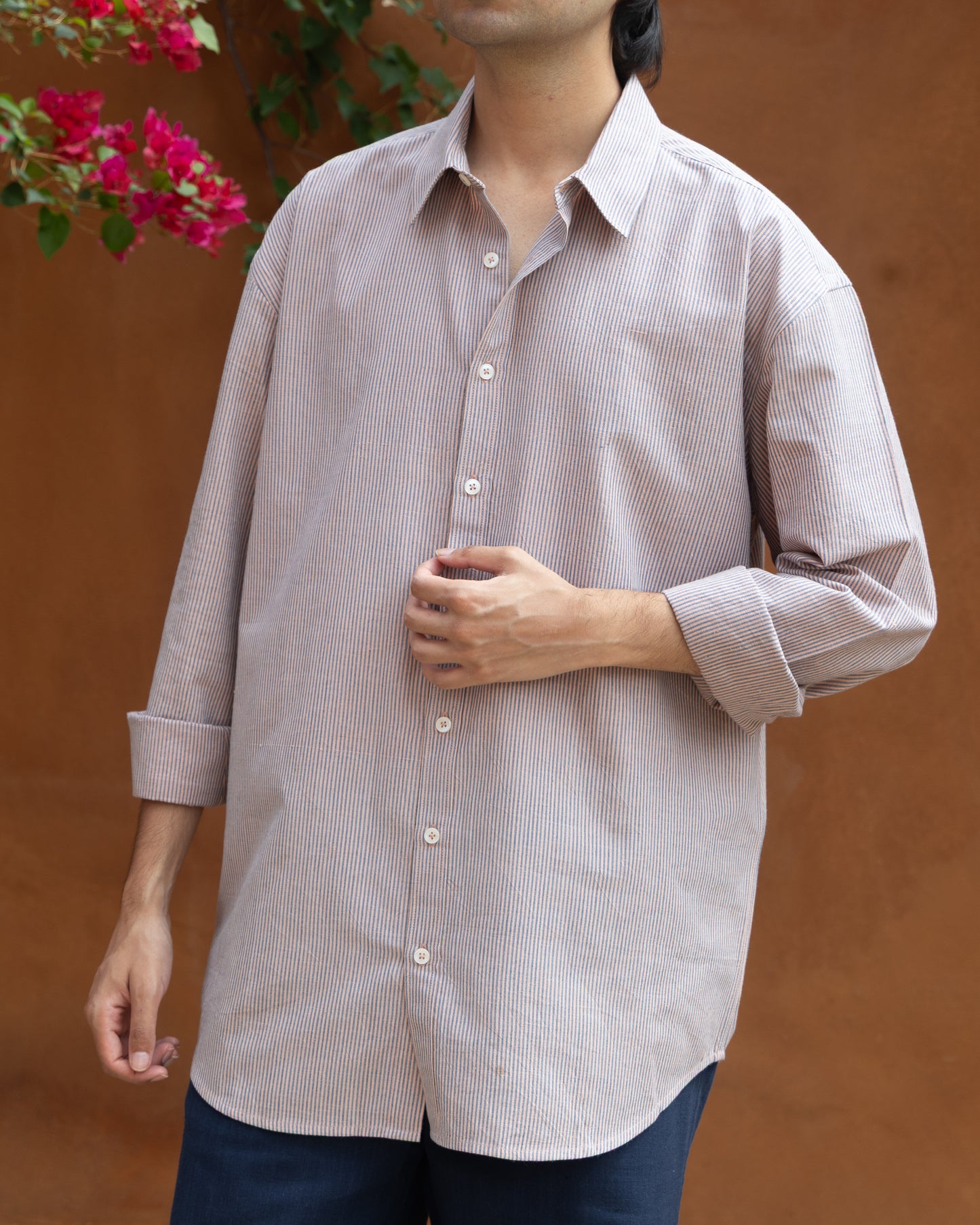 Eco-friendly khadi shirt for men with subtle violet stripes in a comfortable relaxed fit, crafted from handloom organic cotton for an earthy, light-colored look.