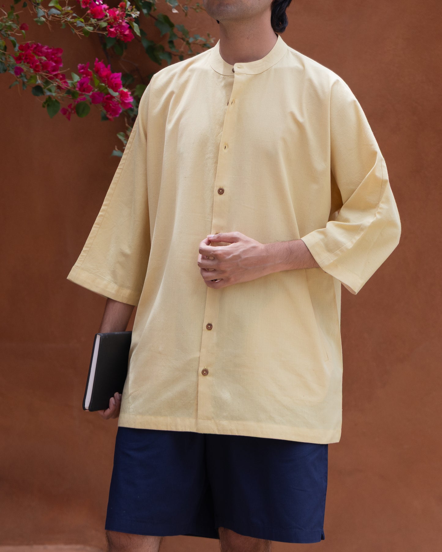 Handloom turmeric color kimono shirt for men, featuring camp collar and earthy tones, ideal for sustainable fashion lovers.