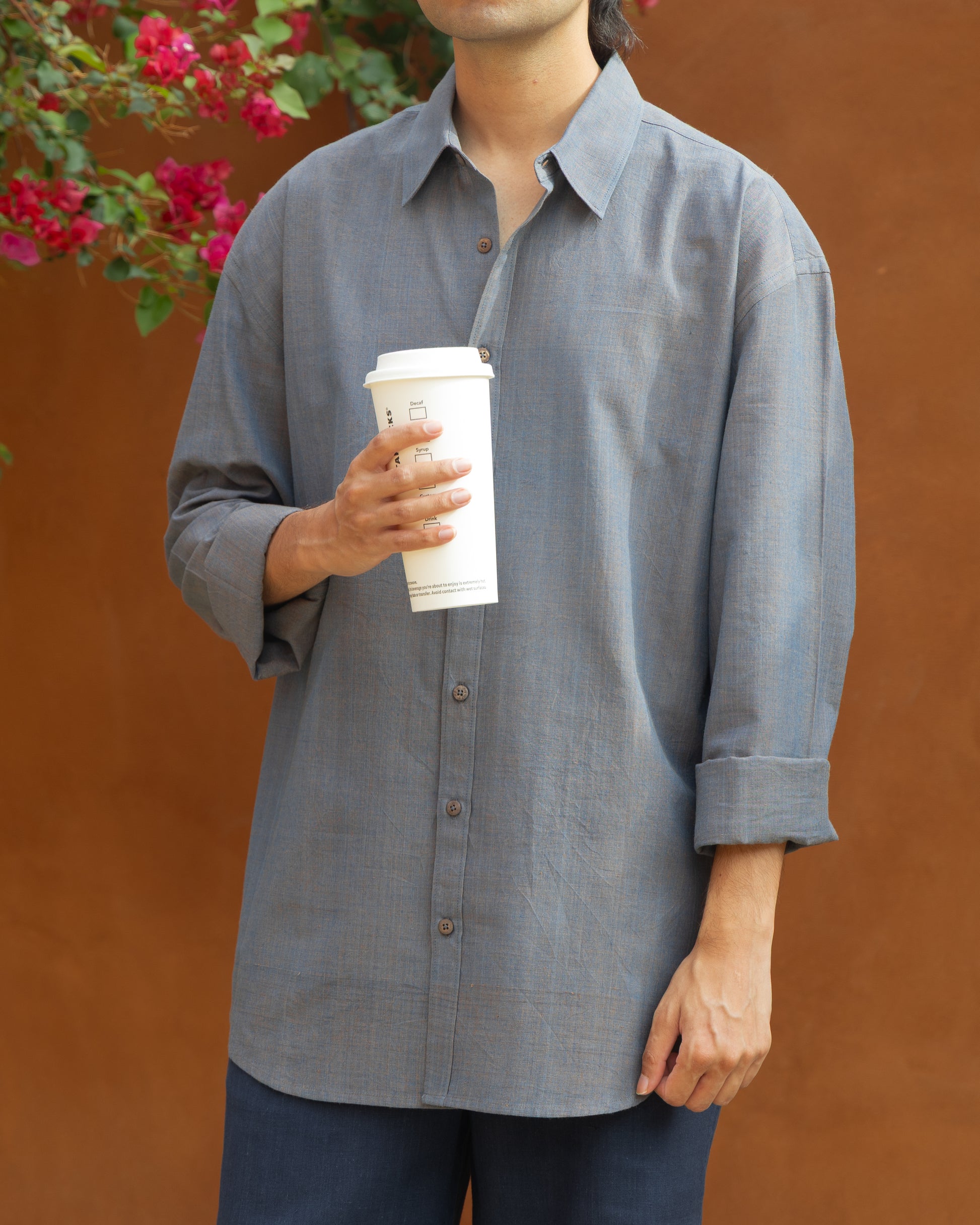 Charcoal grey relaxed fit Khadi cotton shirt for men, handcrafted from organic cotton handloom fabric. Eco-friendly, handwoven luxury shirt in earthy tone, perfect light color shirt for men seeking sustainable Khadi clothes.