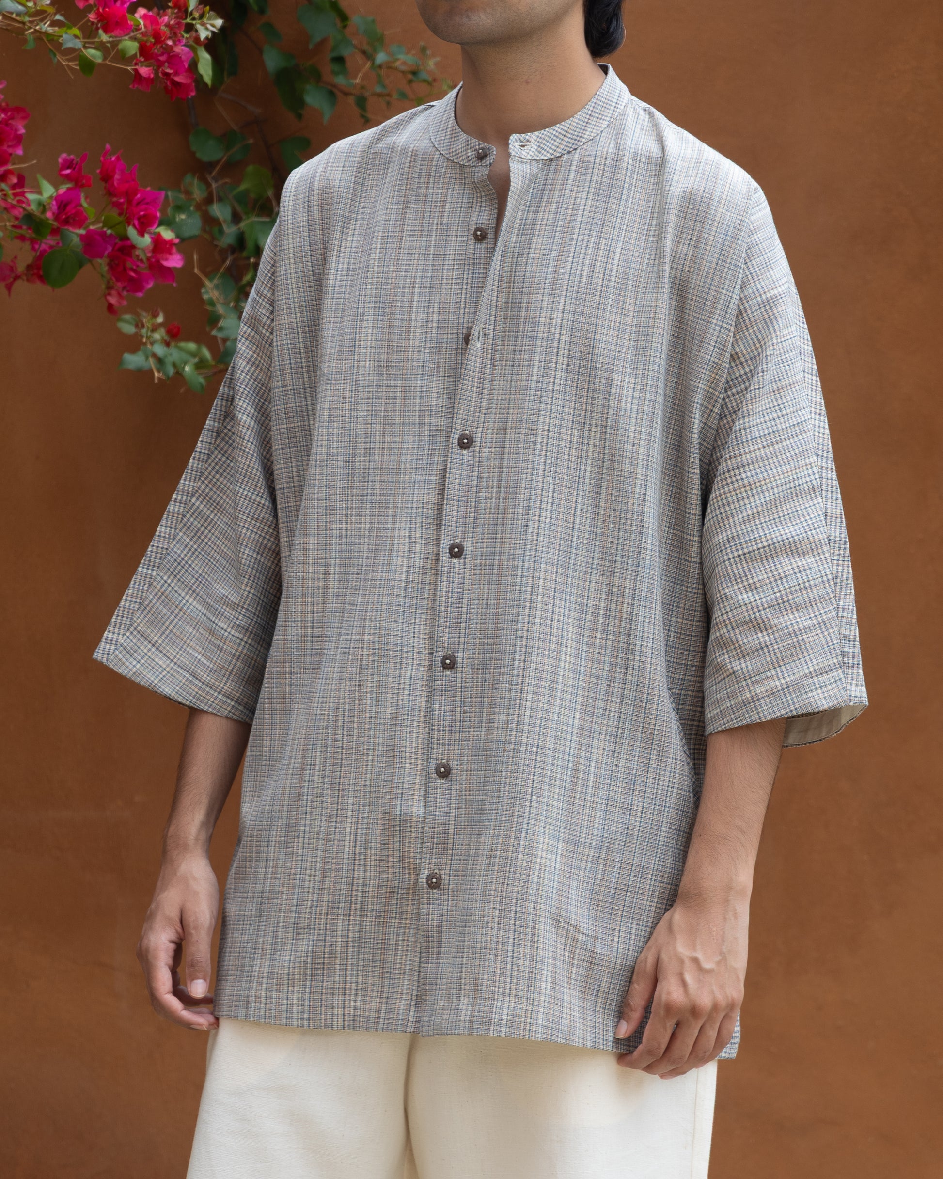 Handloom Khadi shirt for men in earth-tone checks, inspired by Japanese kimono style with a modern camp collar.