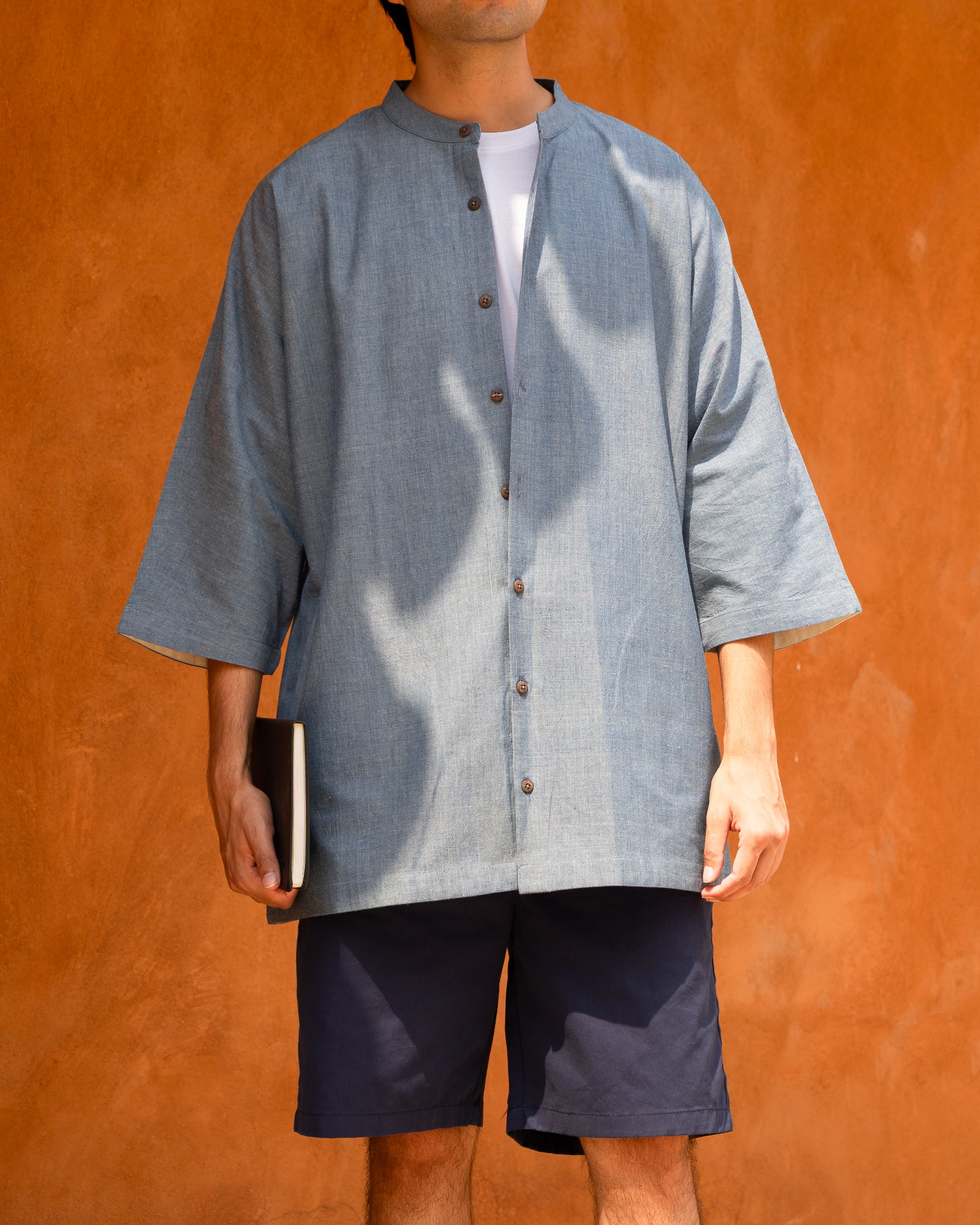 Men's chambray blue Khadi cotton kimono sleeve shirt, light color and earthy tone, crafted from organic cotton and handloom fabric.