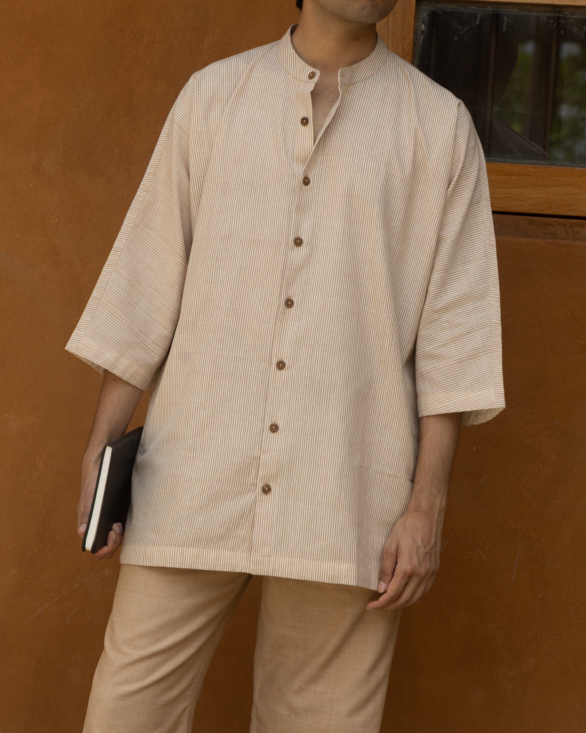 Nutbrown striped khadi cotton kimono shirt for men with 3/4 sleeves, handwoven in earthy chocolate and khaki tones.